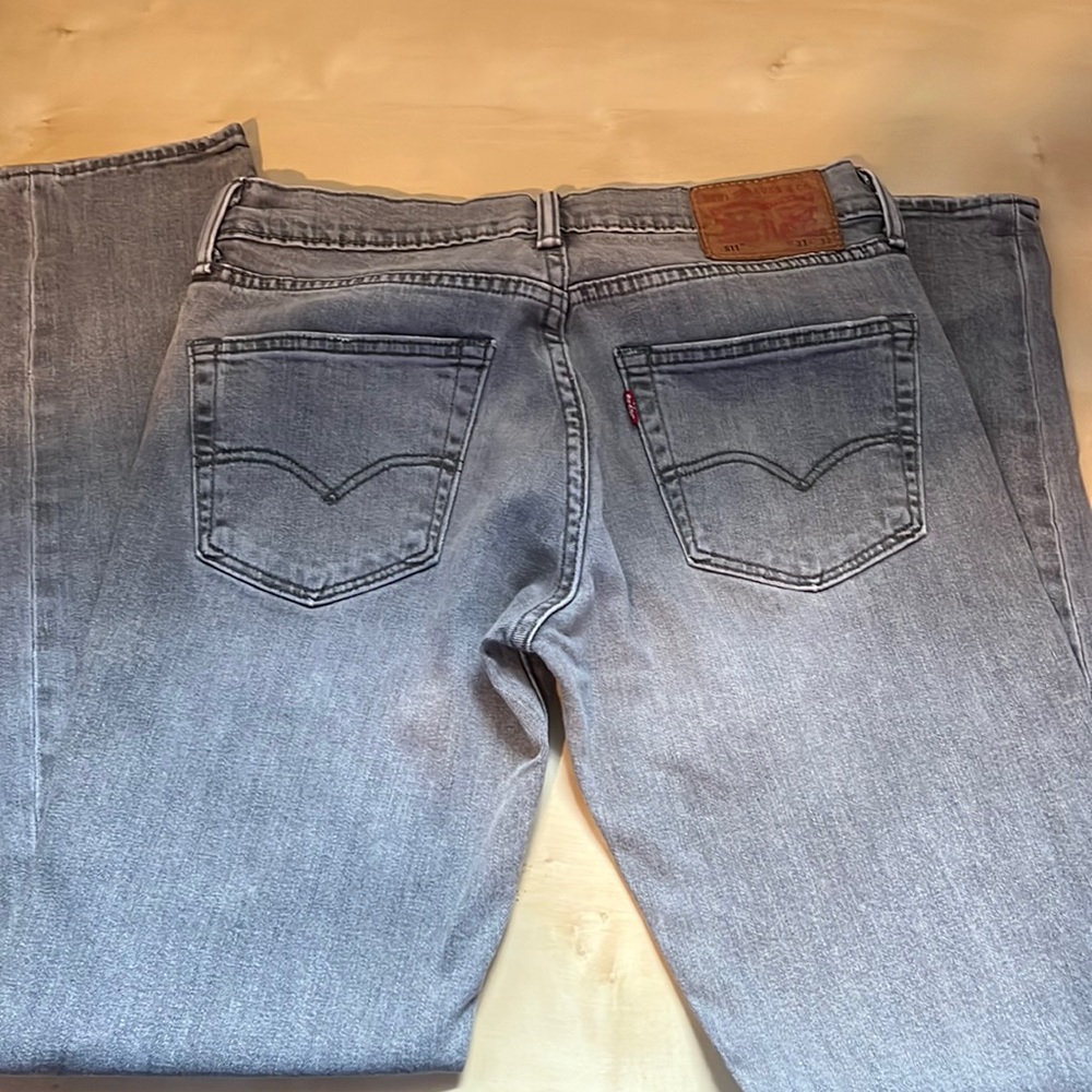 Gray fade wash color jeans, softer material but still jeans